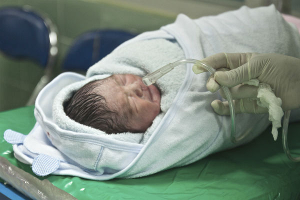 A newborn baby.